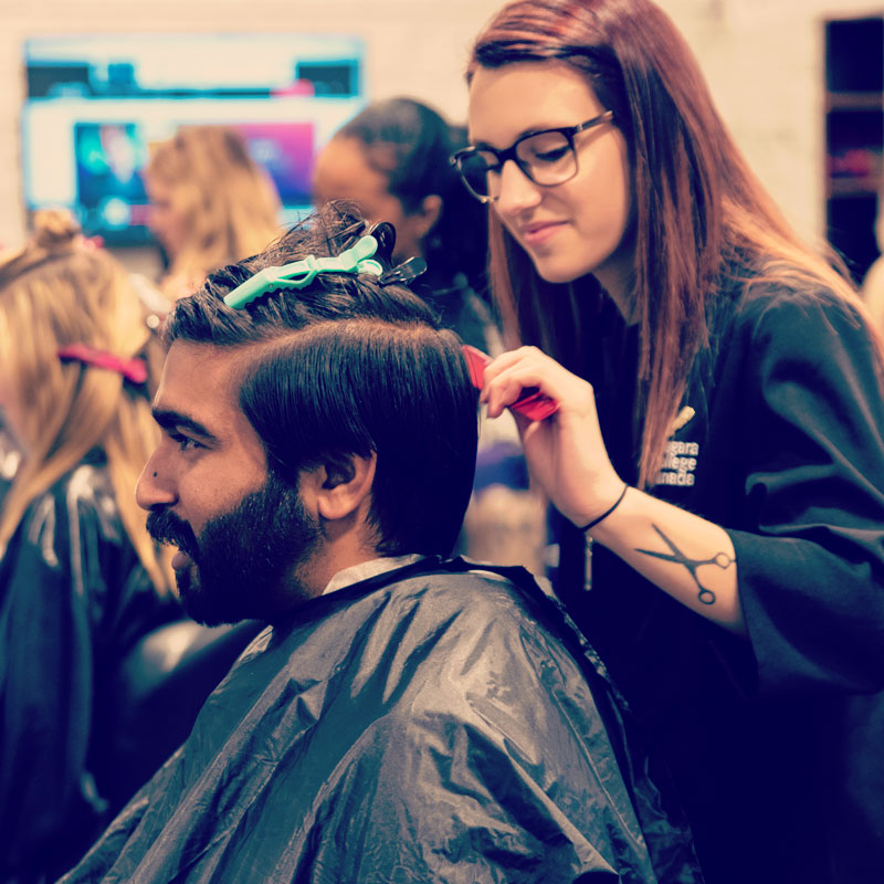 student-cutting-hair